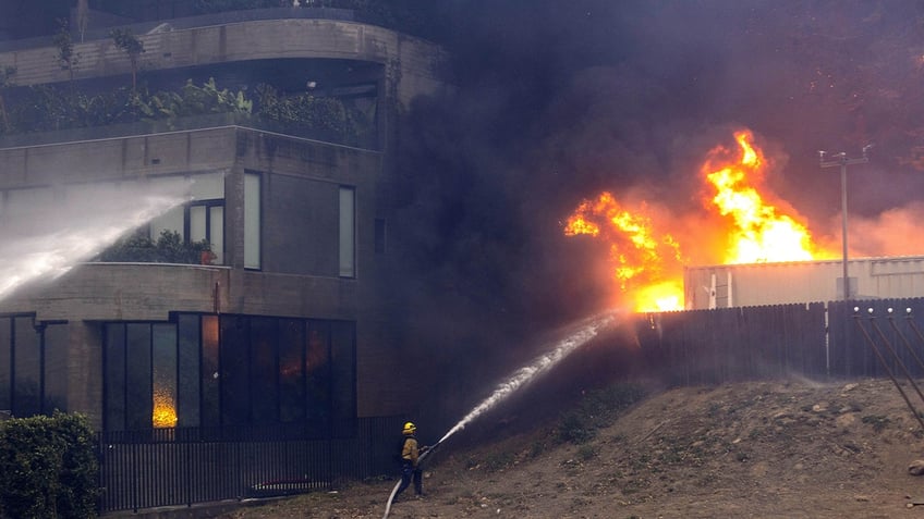 firefighters battling fires in California