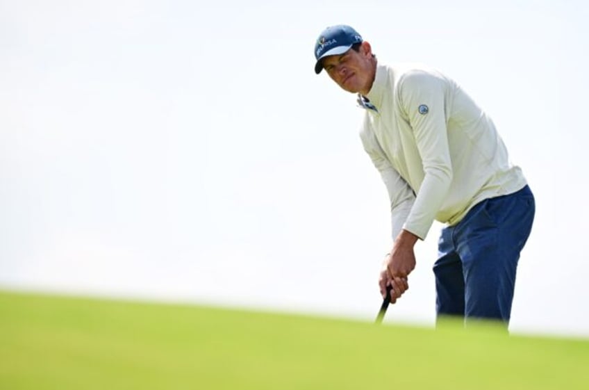 fleetwood joins amateur lamprecht at top of british open leaderboard