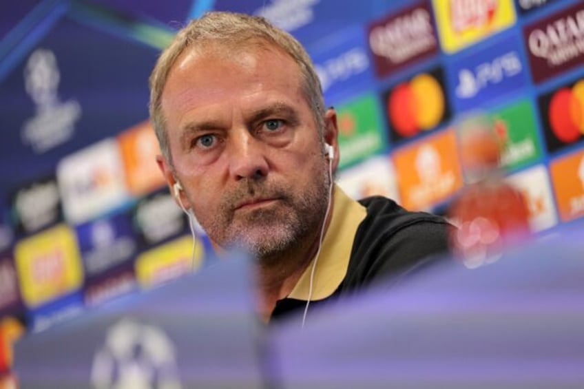 Barcelona coach Hans-Dieter Flick speaks at a press conference on the eve of the UEFA Cham