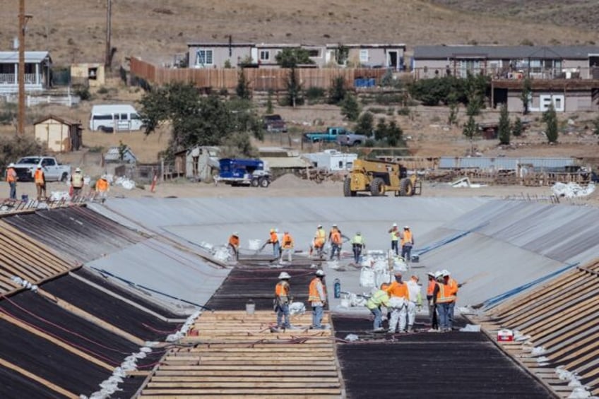 flooded us town fights to stop repair of its leaking canal