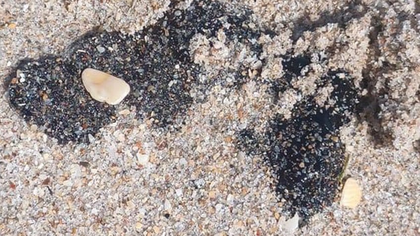 Reports of mysterious tar balls are popping up on beaches in South Florida.