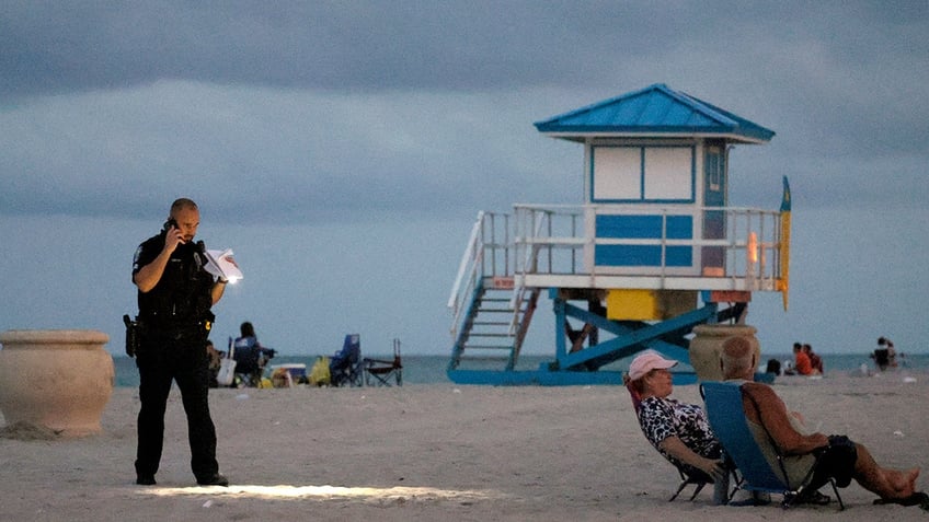 A police officer on the sand in Fort Lauderdale, Florida