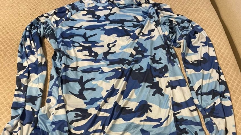 The camouflaged shirt authorities collected from the suspect's house