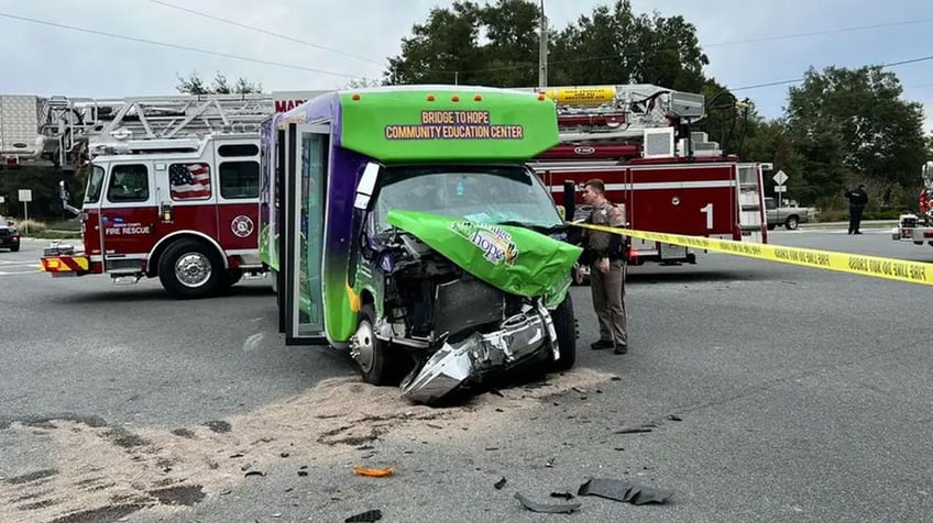 florida fire rescue vehicle gets slammed onto its side in crash with bus truck while responding to call