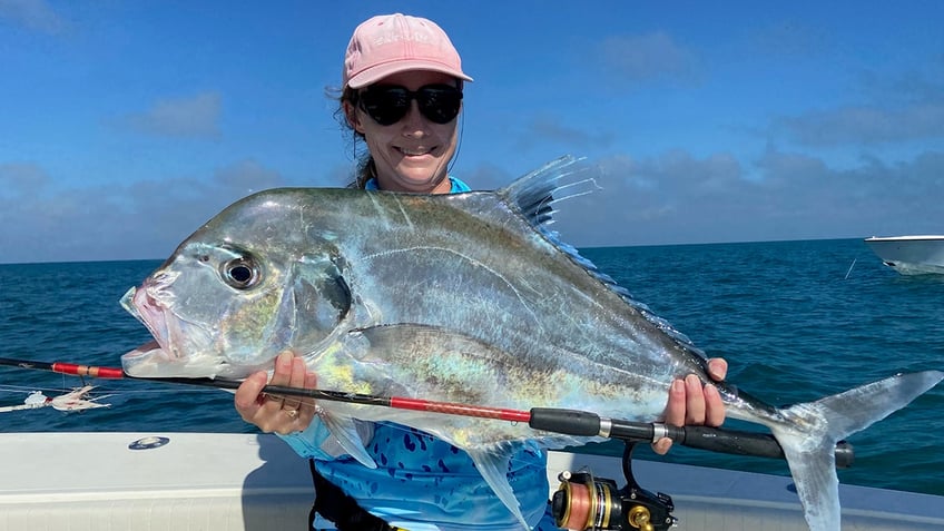 Mom holding large fish