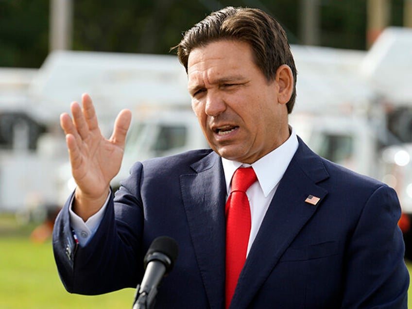 Florida Gov. Ron DeSantis gestures during a news conference, Wednesday, Sept. 25, 2024, at