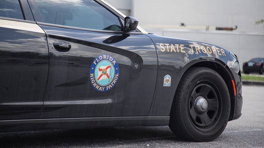 florida man accused of pulling gun on trooper in slow moving traffic