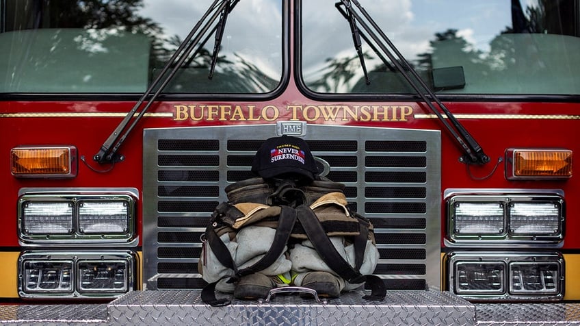 A memorial for former Buffalo Township Volunteer Fire Department chief Corey Comperatore is displayed at his firehall