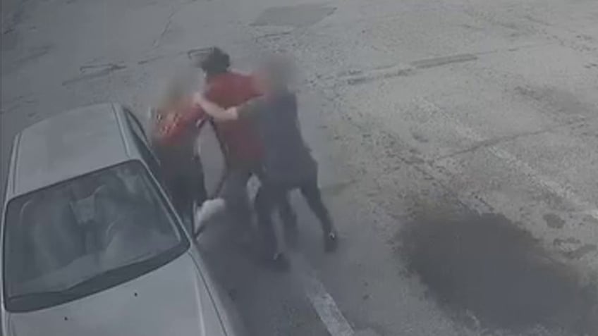 Suspect attacks woman