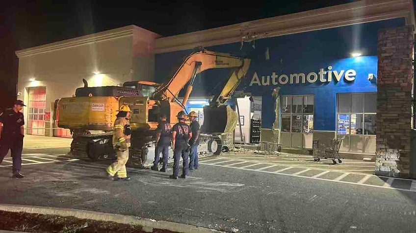 florida man plows stolen excavator into walmart police say