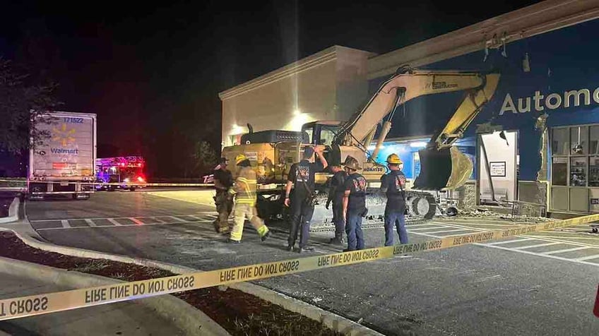 florida man plows stolen excavator into walmart police say