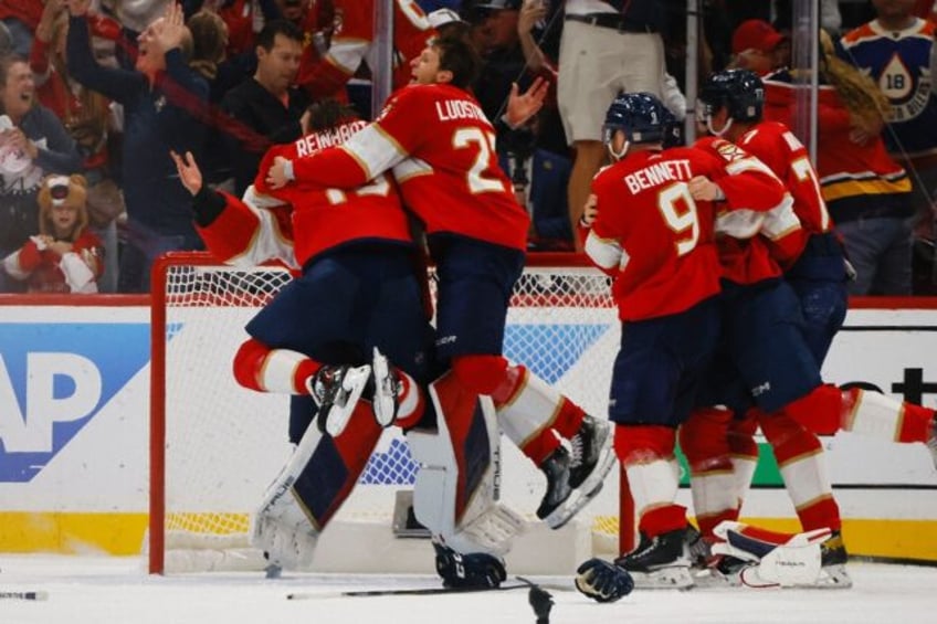 Florida Panthers players celebrate after clinching victory in the Stanley Cup