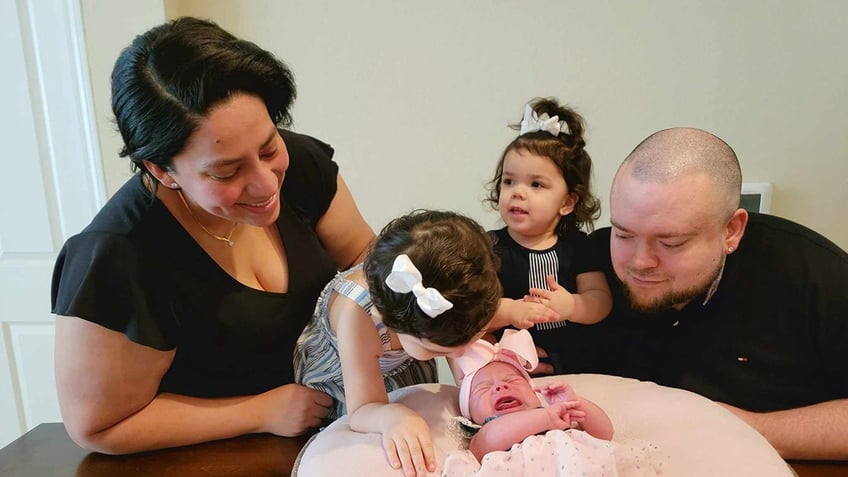 florida parents welcome third baby girl born on same day as their other daughters our mouths dropped