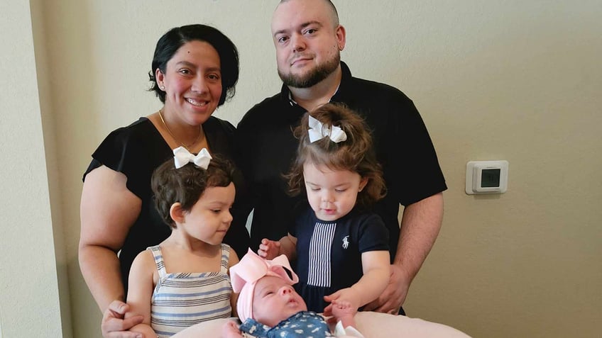 florida parents welcome third baby girl born on same day as their other daughters our mouths dropped