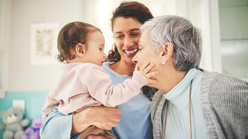 grandma with her daughter and baby