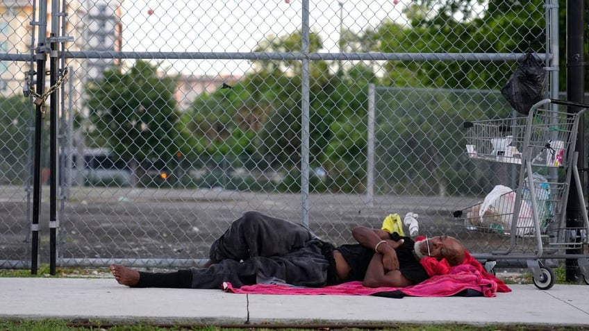 A homeless person sleeping rough in Florida