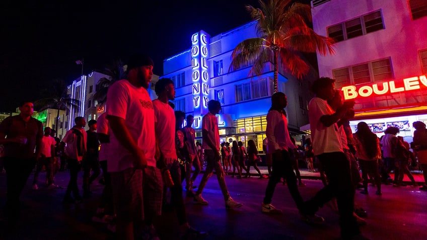 People walking at night