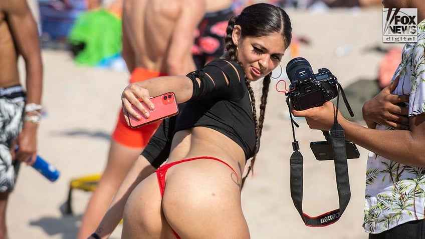 Spring breakers spend time on Fort Lauderdale Beach.