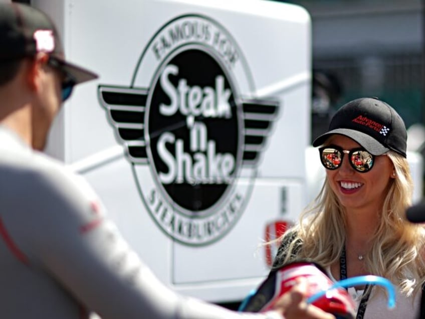 NDIANAPOLIS, IN - MAY 26: Graham Rahal, driver of the #15 Steak n' Shake Honda stands on t