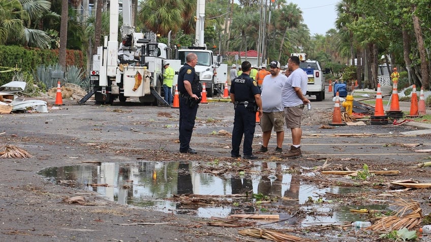 florida storms send porta potty door flying impales into a light pole national flag of florida