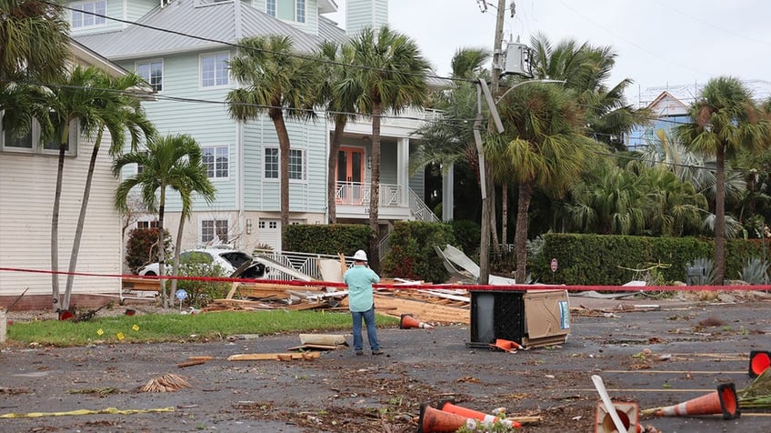 florida storms send porta potty door flying impales into a light pole national flag of florida