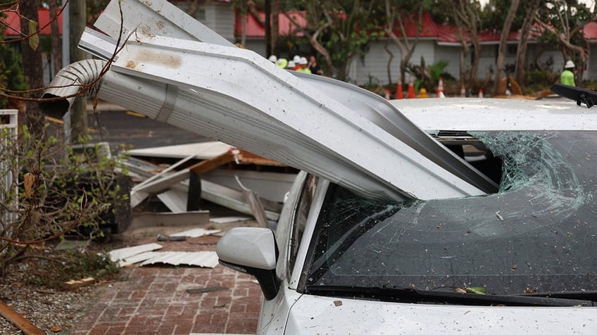 florida storms send porta potty door flying impales into a light pole national flag of florida