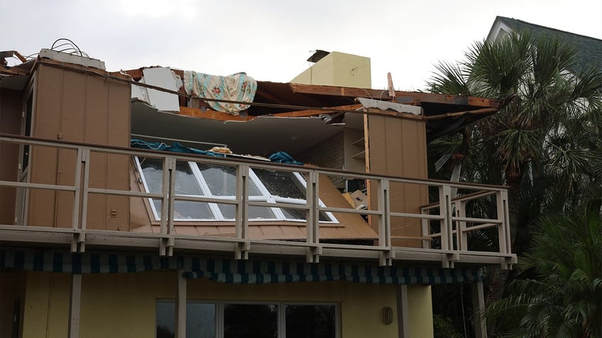 florida storms send porta potty door flying impales into a light pole national flag of florida