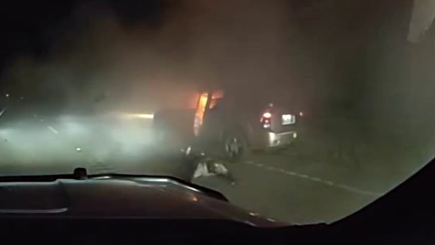 Dashcam video of a fire in an SUV