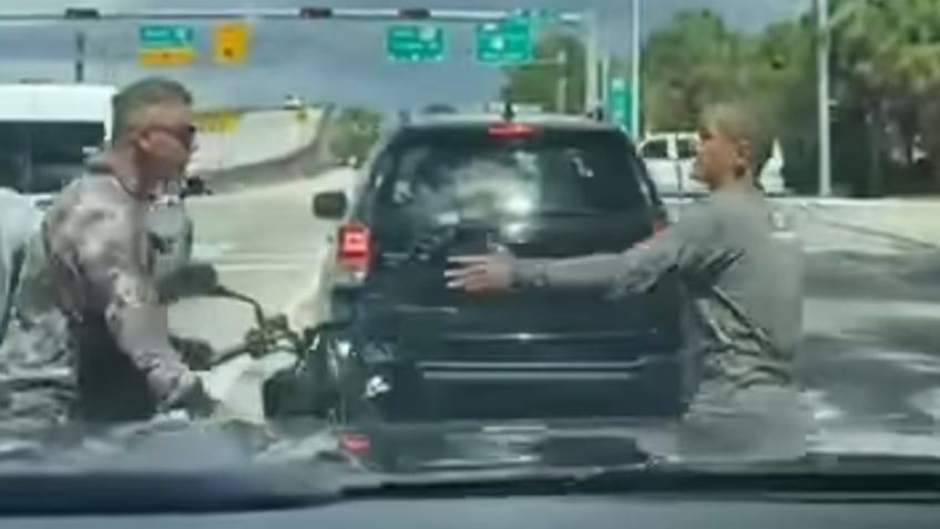 florida video shows driver swinging machete during road rage incident