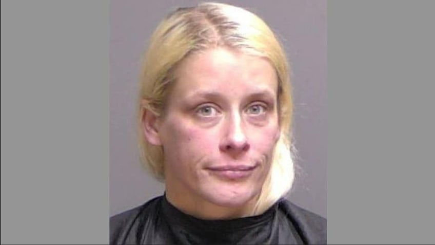 florida woman arrested after leaving son 11 in hotel room with dead man following menage a trois with 2 men