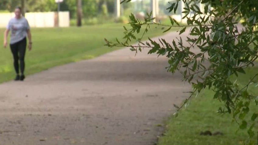 florida woman chases off man who grabbed her waist thrust against her on walking trail