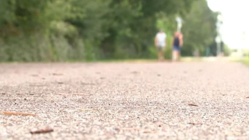 florida woman chases off man who grabbed her waist thrust against her on walking trail