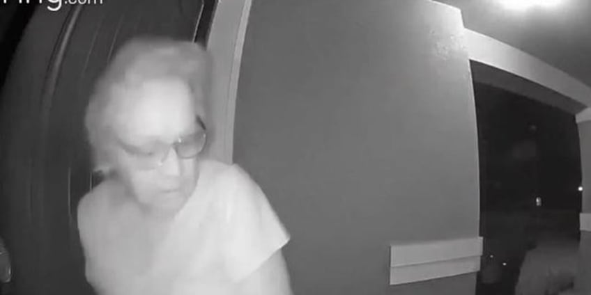 florida woman surprised by bear outside her door doorbell camera footage shows i got a surprise