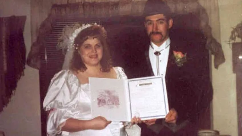 Greg and Kimberly Malnory at their wedding, just six months before they were killed