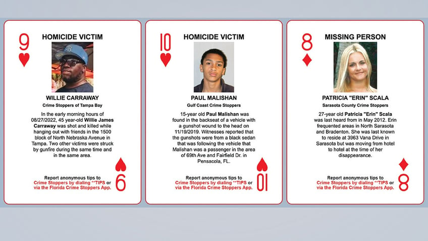 Three playing cards with homicide victims and a missing person featured on them.