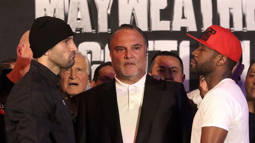 Floyd Mayweather Jr and John Gotti III face off