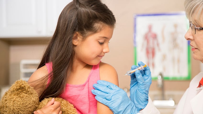 Child getting vaccine