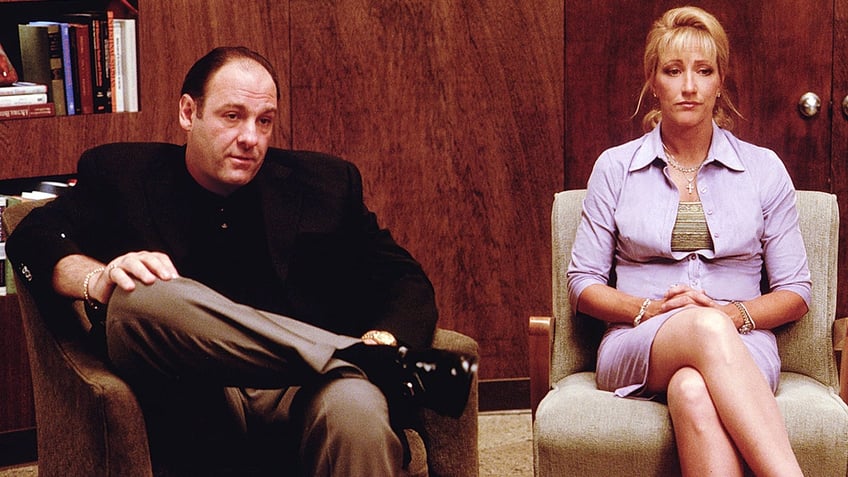 James Gandolfini sitting next to Edie Falco