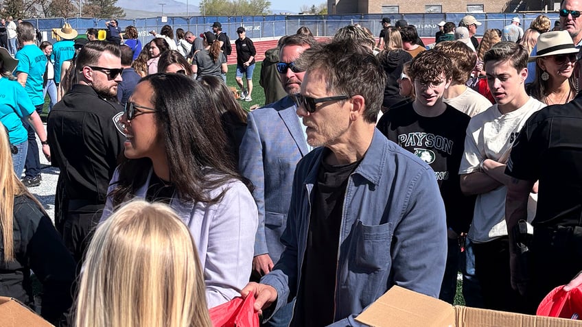 Kevin Bacon visiting the high school where they once filmed "Footloose."