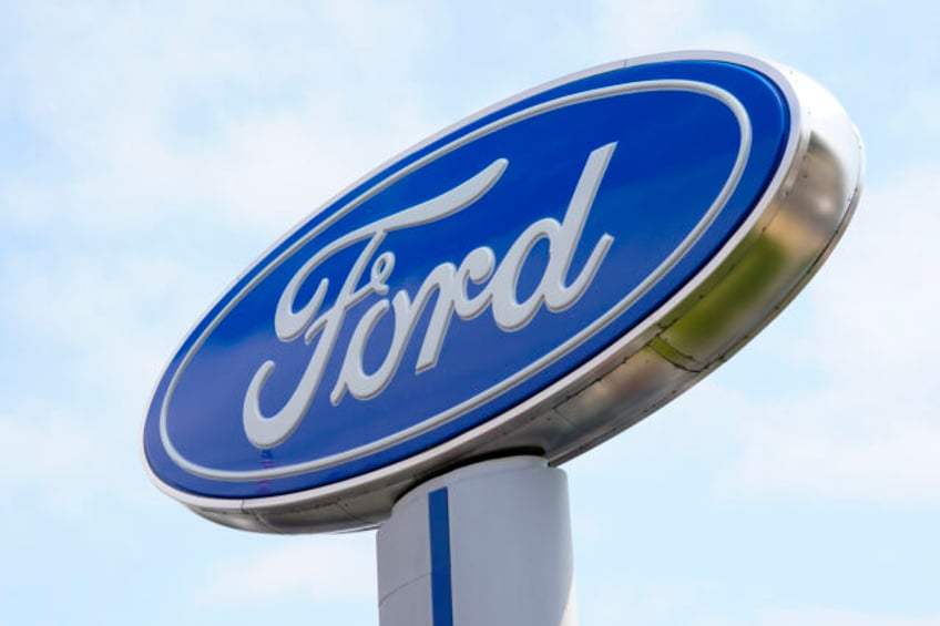 ford earnings fall short of estimates after it strikes a tentative deal with the united auto workers