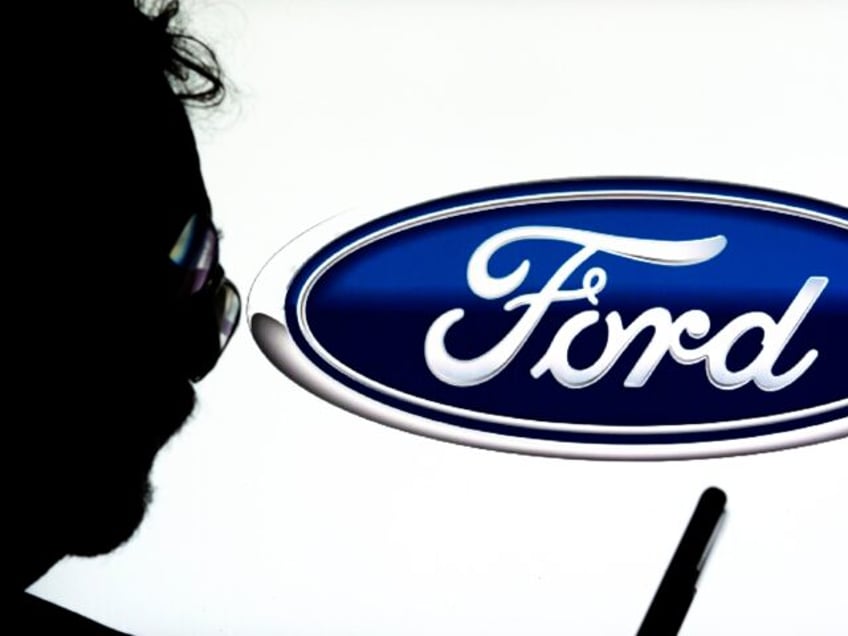 GERMANY - 2024/11/17: In this photo illustration, a Ford Motor Company logo seen displayed