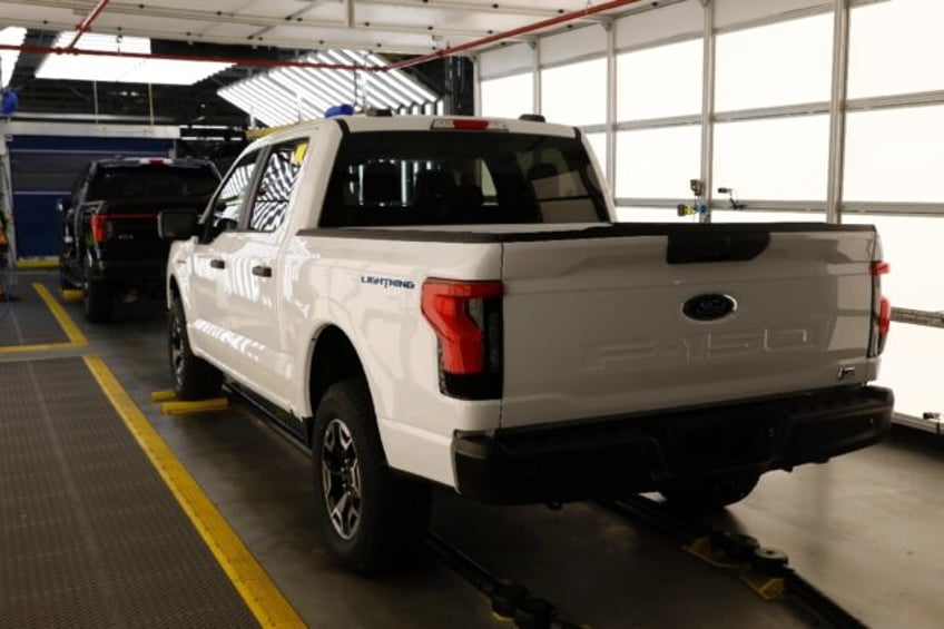 ford raises 2023 profit outlook but sees bigger ev loss