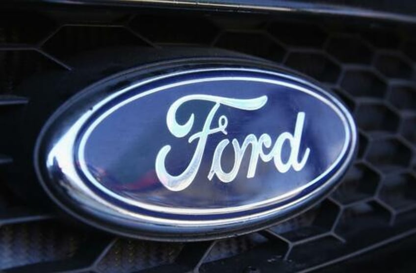 ford shares slide after net income plunge suspended guidance