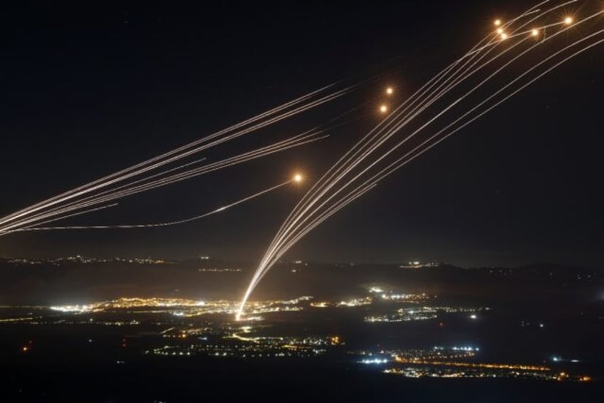 Rockets fired from southern Lebanon are intercepted by Israeli air defences