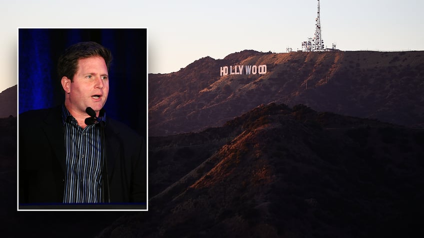 Former TV executive on backdrop of Hollywood sign