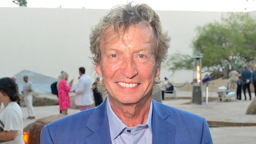 Nigel Lythgoe smiling