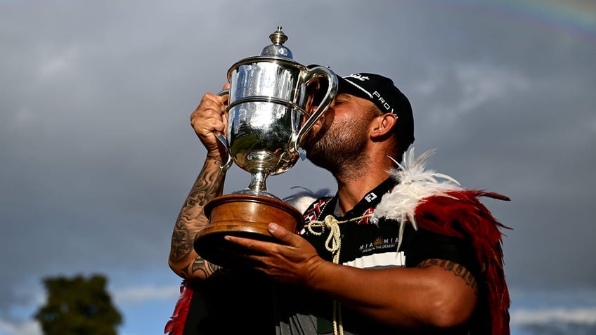 Ryan Peake with trophy