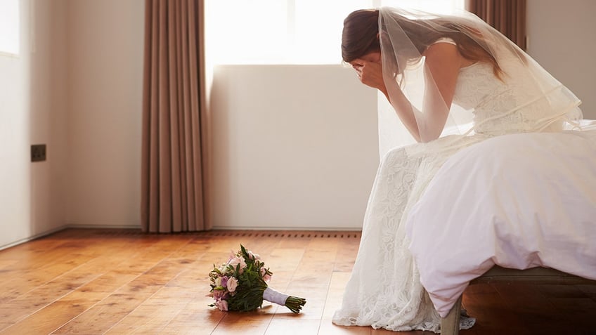 bride crying at wedding