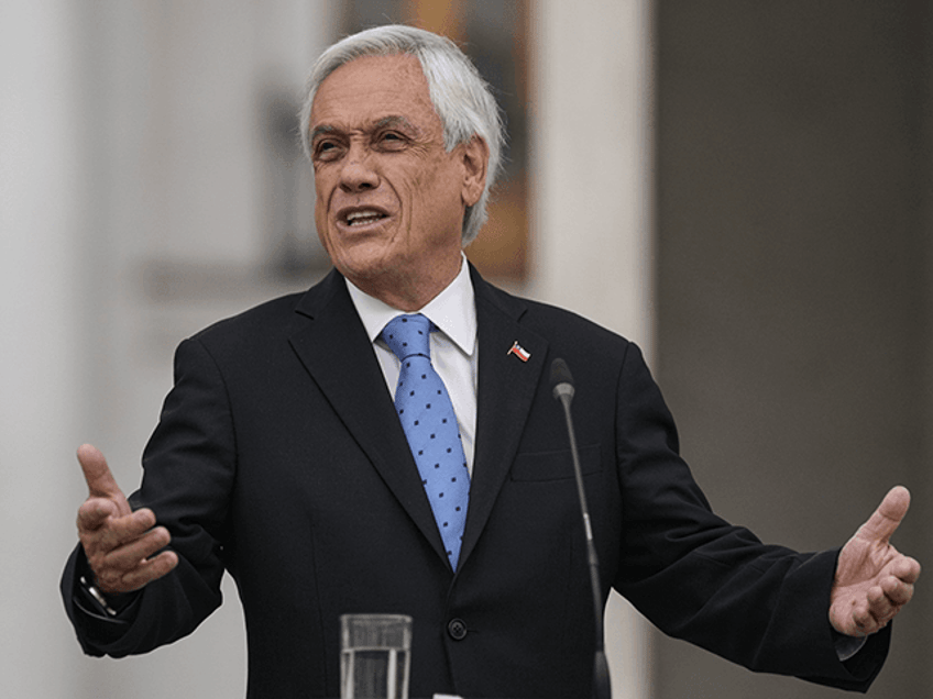 Chilean President Sebastian Piñera gives a press conference at La Moneda presidential palace in Santiago, Chile, Monday, Oct. 4, 2021.