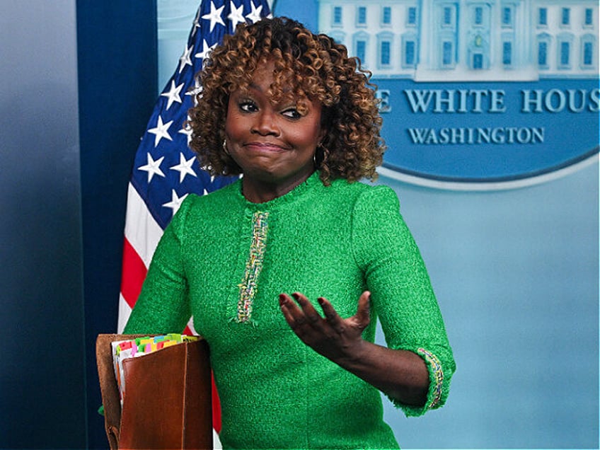 White House press secretary Karine Jean-Pierre reacts at the end of what is expected to be